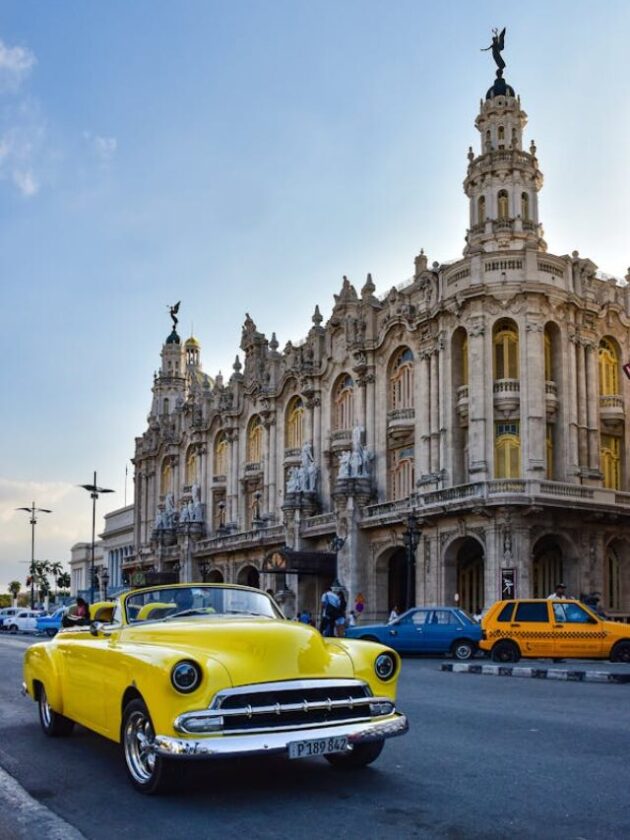 free-photo-of-classic-yellow-convertible-on-street-by-grand-theater-of-havana